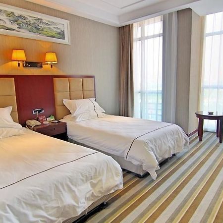 Meijing Business Hotel Zhengzhou Buitenkant foto