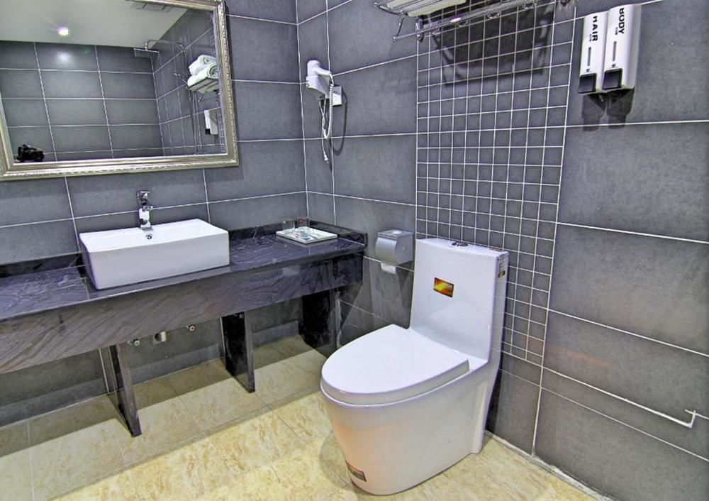 Meijing Business Hotel Zhengzhou Buitenkant foto