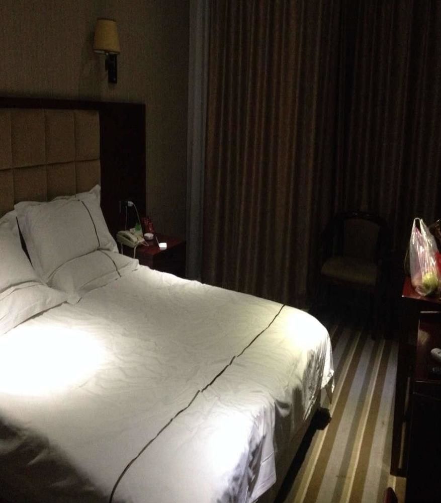 Meijing Business Hotel Zhengzhou Buitenkant foto